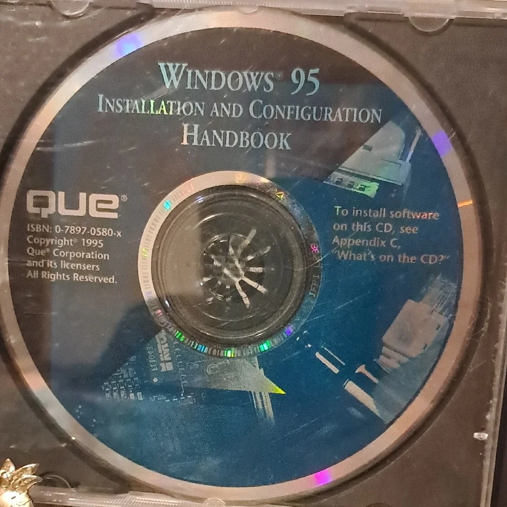 Microsoft Windows 95 and Office CD Set - Silver, Black, and Blue